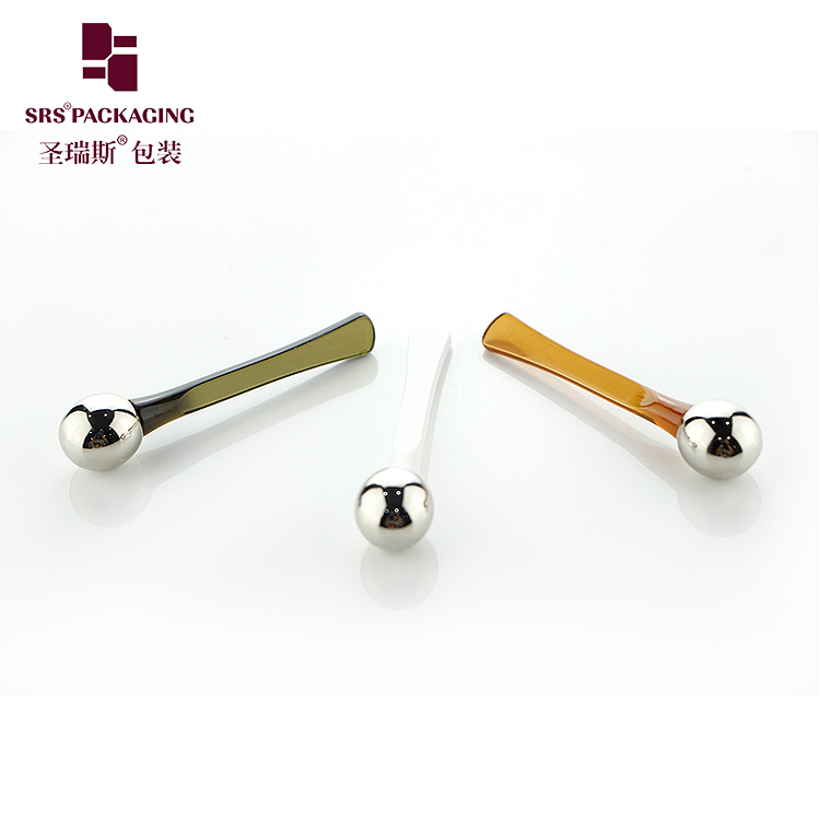 Plastic eye cream stick metal eye massage head and cosmetic beauty cream digging spoon