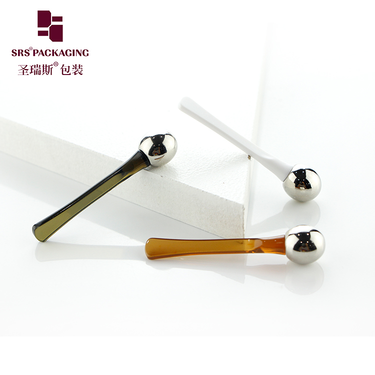 Plastic eye cream stick metal eye massage head and cosmetic beauty cream digging spoon