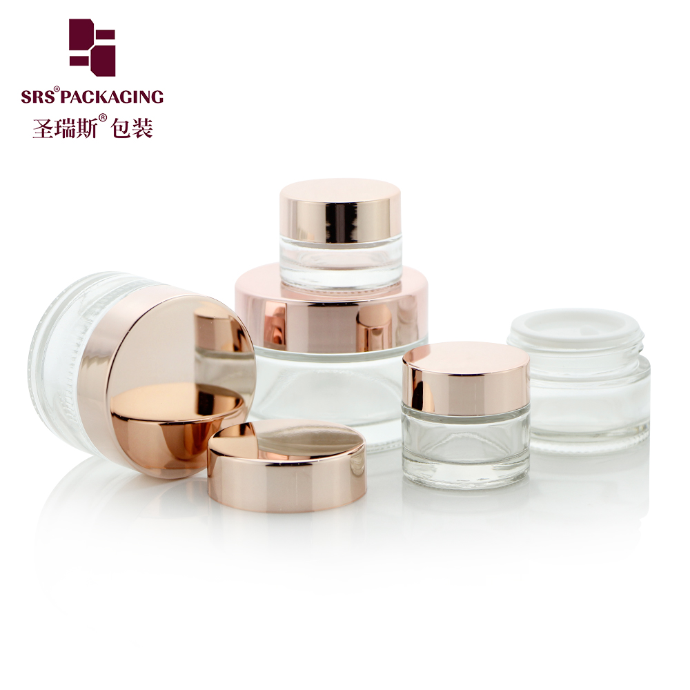 J319 Customized cosmetic glass cream jars 5ml 10ml 15ml 30ml 50ml clear jar with rose gold cap